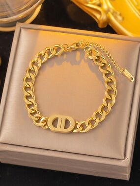 Gold Chain Bracelet with Oval Logo Accent